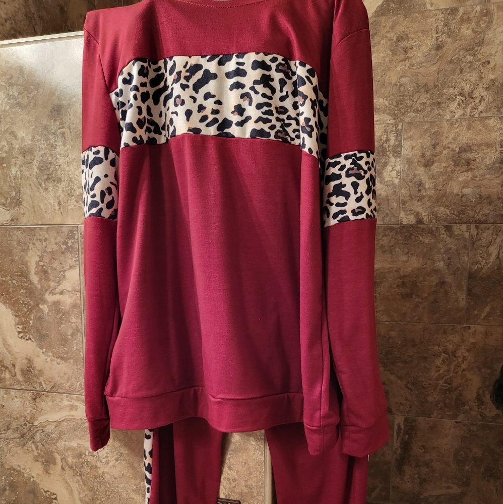 Womens maroon and leopard print jogging suit. Super comfy
